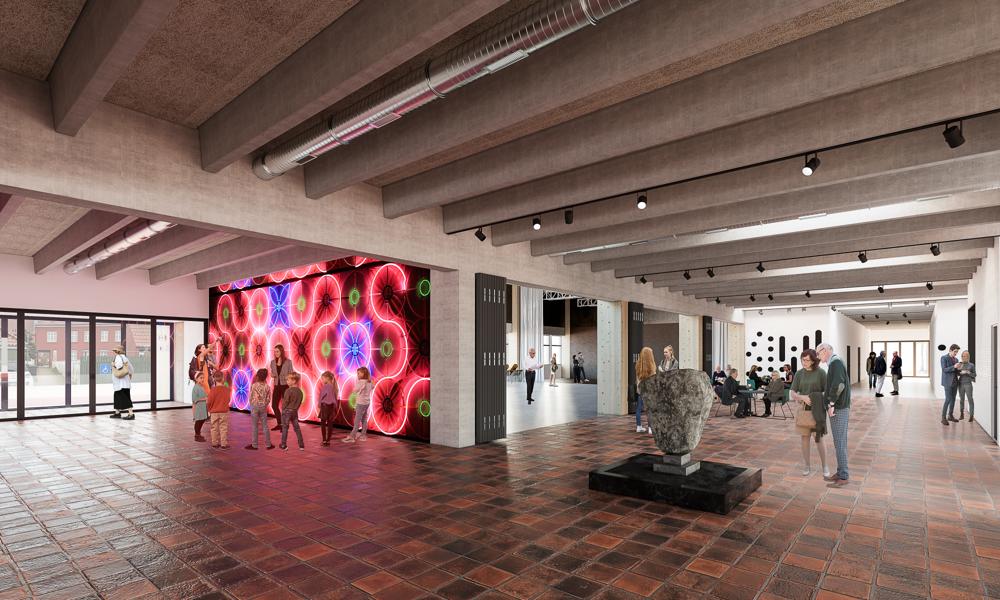 I kulturhusets foyer bydes gæster velkommen ind i de nye lokaler. I kulturhusets foyer bydes gæster velkommen ind i de nye lokaler.