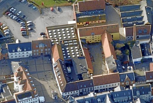 Foto af det centrale Hobro, der kan få et markant anderledes udseende. Skråfoto: Styrelsen for Dataforsyning og Effektivisering