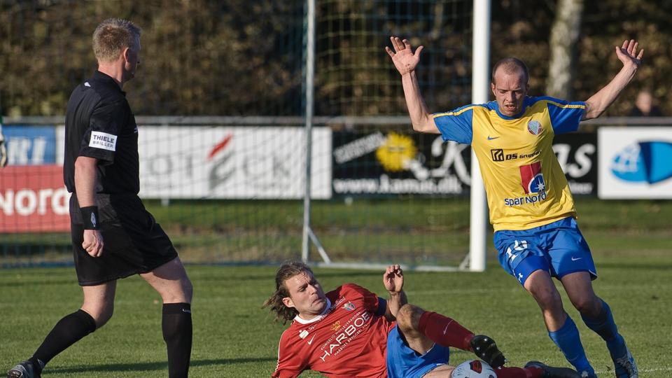 Kristoffer Wichmann (i rød trøje) er involveret i ny matchfixing-sag. Det skriver eb.dk.Foto: Martin Damgård