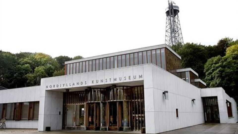 Nordjyllands Kunstmuseum blev opført i årene 1968-1972 og er tegnet af Elissa og Alvar Aalto og Jean-Jacques Baruël. Bygningerne blev indviet 8. juni 1972 og blev fredet i 1995. I december 2008 skiftede Nordjyllands Kunstmuseum navn og hedder i dag K