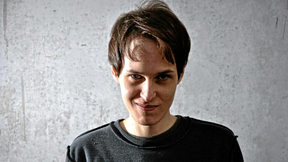 Crazy young man with the face of evil