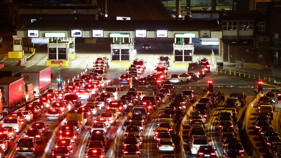 Vehicles queue up at the entrance of Port of Dover <i>Henry Nicholls/Reuters</i>