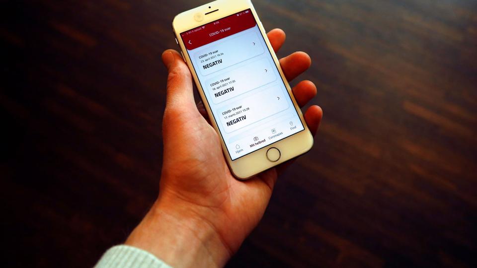 A cell phone with the COVID-19 passport app, in Copenhagen <i>Tim Barsoe/Reuters</i>