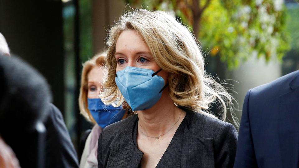 Theranos founder Elizabeth Holmes arrives to attend her fraud trial at federal court in San Jose <i>Brittany Hosea-Small/Reuters</i>