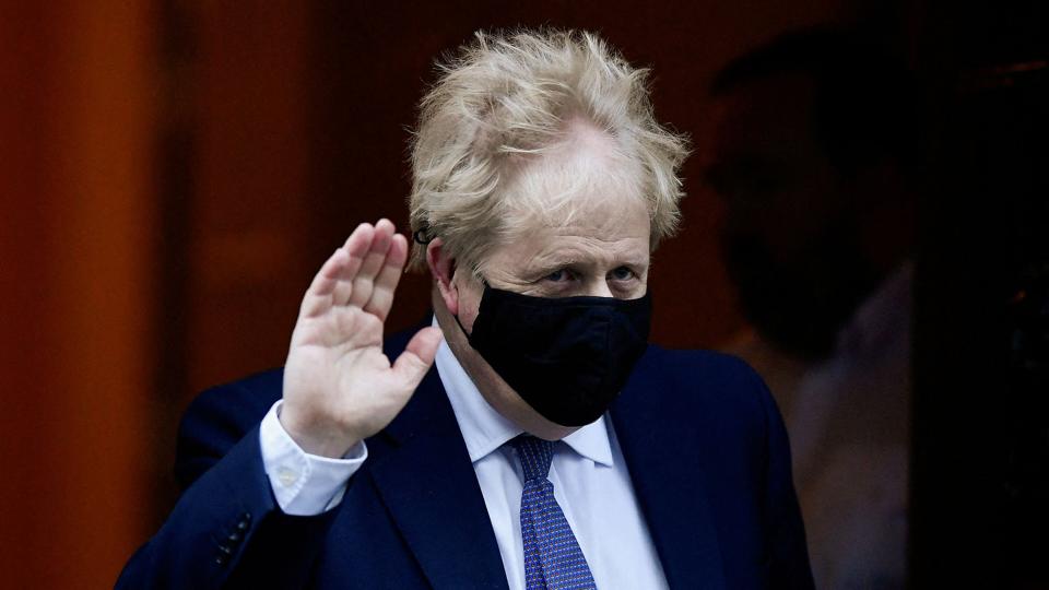 FILE PHOTO: British Prime Minister Boris Johnson gestures as he leaves Downing Street to attend Prime Minister''s Questions in Parliament, in London, Britain <i>Toby Melville/Reuters</i>