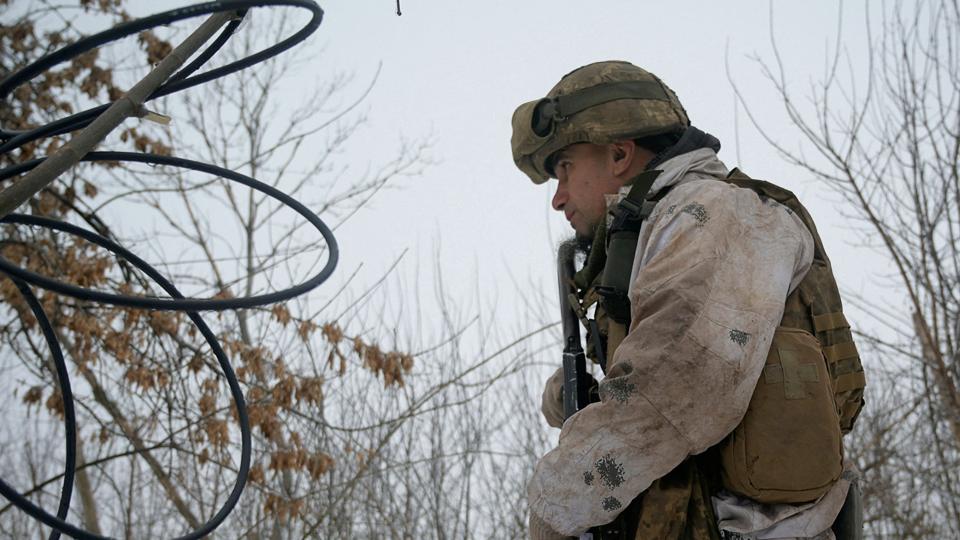 A service member of the Ukrainian armed forces is seen at combat positions in Donetsk Region <i>Maksim Levin/Reuters</i>