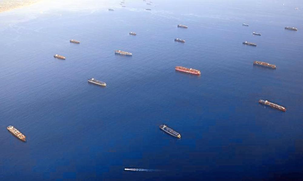 Der var tale om et "globalt kollaps i transportsystemet" da antallet af containere ind mod USA slog alle rekorder i 2021. Her en kø af containerskibe ud for Los Angeles. Der var tale om et "globalt kollaps i transportsystemet" da antallet af containere ind mod USA slog alle rekorder i 2021. Her en kø af containerskibe ud for Los Angeles.
