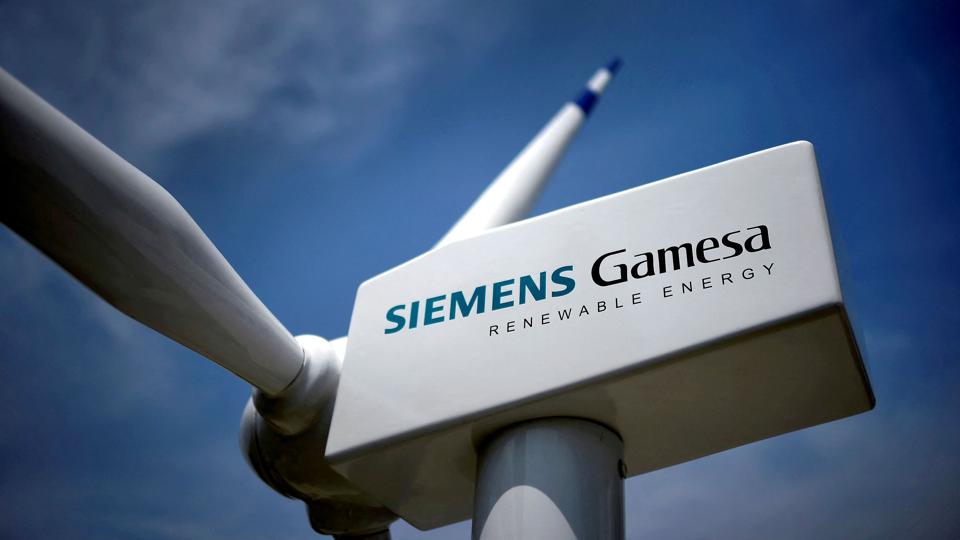 FILE PHOTO: A model of a wind turbine with the Siemens Gamesa logo is displayed outside the annual general shareholders meeting in Zamudio <i>Vincent West/Reuters</i>