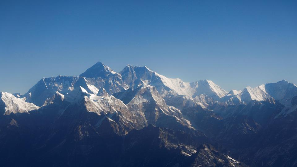 FILE PHOTO: Mount Everest, the world highest peak, and other peaks of the Himalayan range are seen through an aircraft window during a mountain flight from Kathmandu <i>Monika Deupala/Reuters</i>