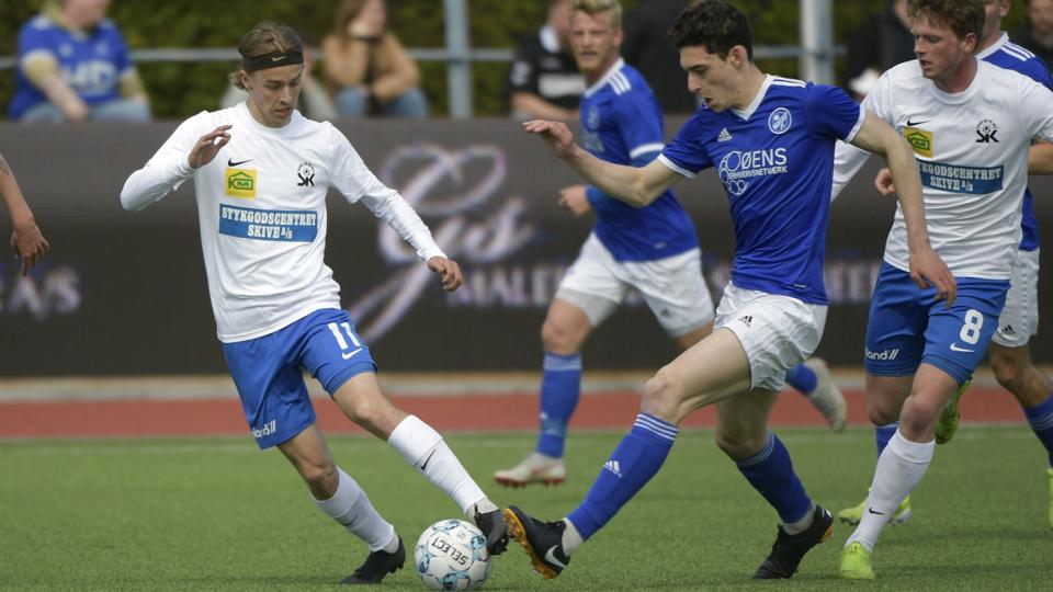 Fremad Amager-spillerne (i blåt) har ikke fået løn som aftalt mandag. (Arkivfoto) <i>Nils Meilvang/Ritzau Scanpix</i>