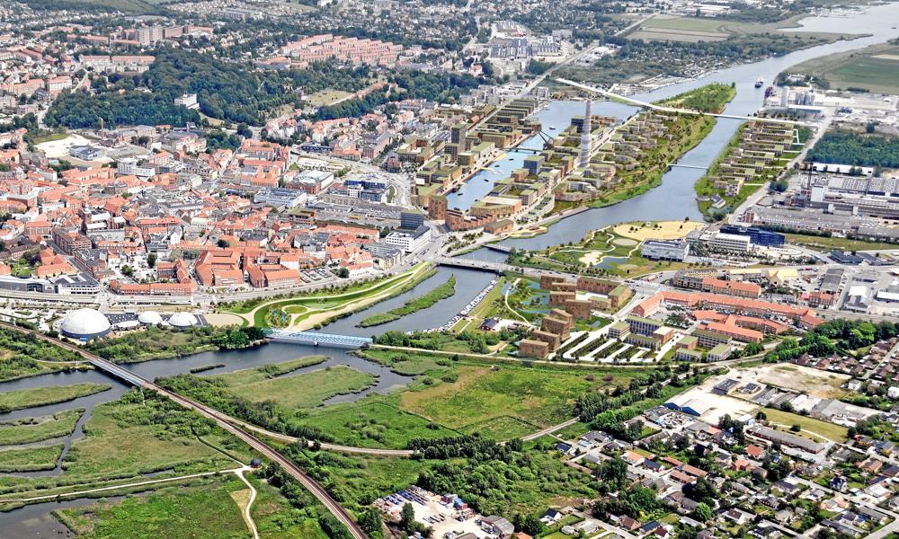 Over en lang årrække flytter havnen ud af Randers by. Det åbner op for nye bydele, Flodbyen. Over en lang årrække flytter havnen ud af Randers by. Det åbner op for nye bydele, Flodbyen.