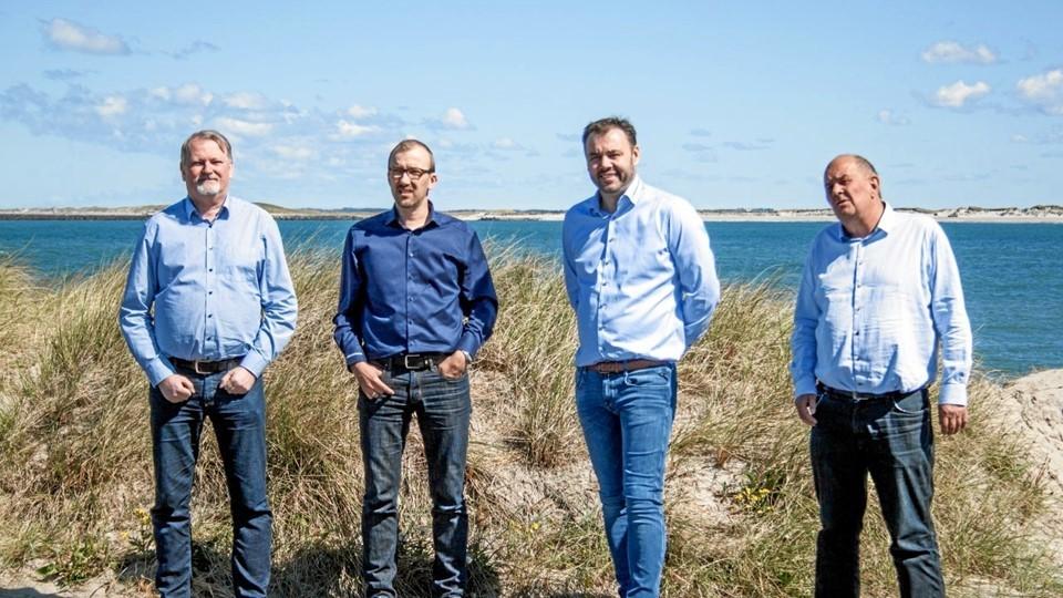 (Fra venstre) Jørgen Riise og Morten Christensen fra MC Revision og Allan Galsgaard og Mads Bjørndal fra Revision Limfjord er her fanget, da overtagelsen blev meddelt. Arkivfoto