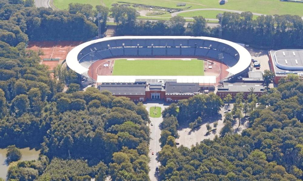 Aarhus' nye stadion skal - ligesom det nuværende - opføres på den ikoniske placering for enden af Stadion Allé.