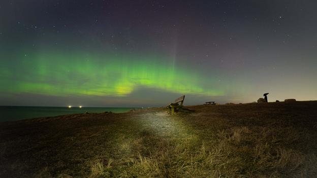 Nordlyset set fra stranden ved Hirtshals. Foto: Arturs Pirazkov