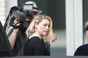Amber Heard dømt til at betale Johnny Depp 15 millioner dollar