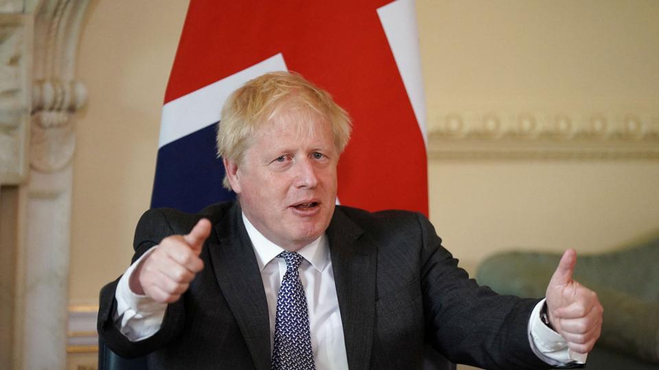 Premierminister Boris Johnsons regering meddelte i april, at man ville sende nogle af de personer, der søger asyl i Storbritannien, til Rwanda. Planen har nu fået grønt lys af både højesteret og ved en appeldomstol. <i>Pool/Reuters</i>