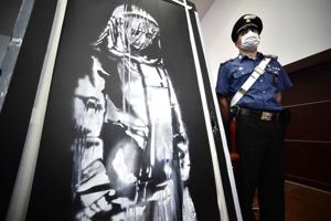 Mænd kendt skyldige i tyveri af Banksy-værk på Bataclan i Paris