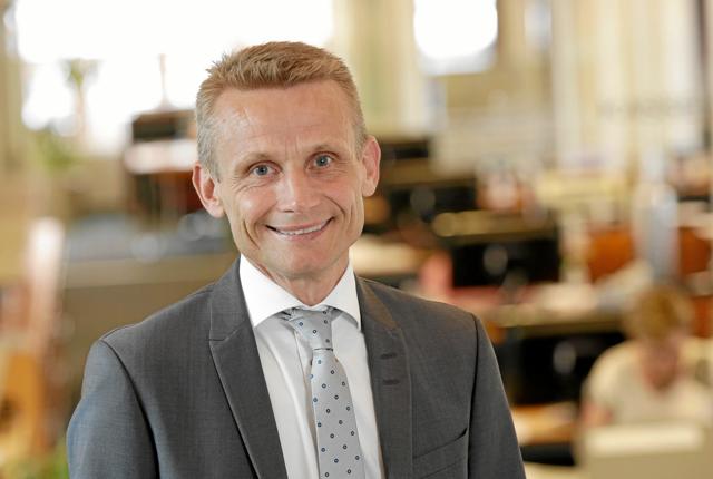 Bankdirektør Claus Andersen er tilfreds med, hvor det er gået siden fusionen.