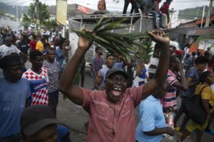 Bølge af drab og høje priser udløser store protester i Haiti