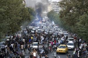 Irans præsident lover at slå hårdt ned på demonstranter