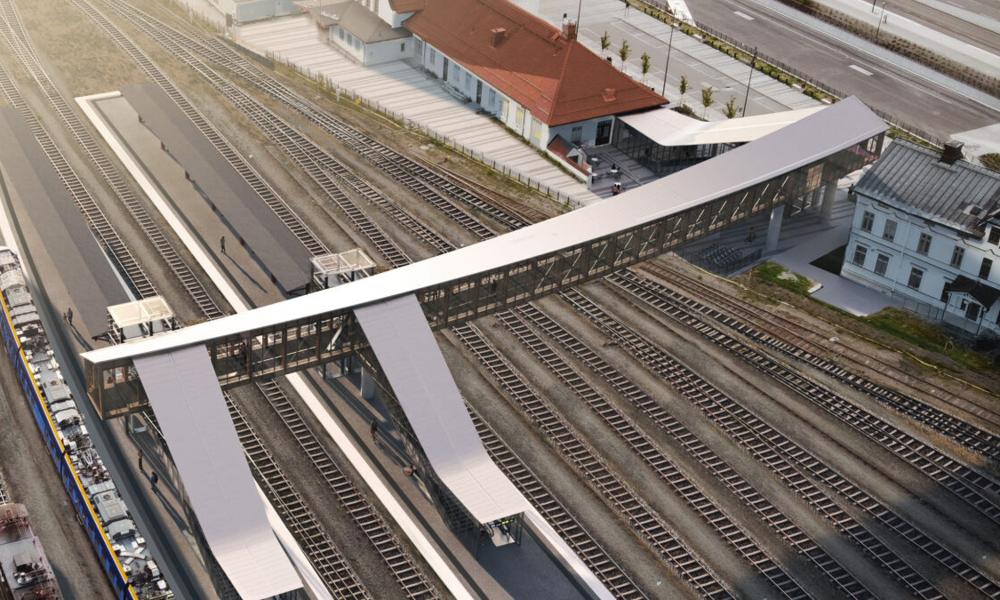 – Gangbroens materialitet og elegante, snoede geometri danner en markant figur i det ellers stramme stations-landskab og er samtidig et supplement til et helt unikt sted, forklarer Jesper Henriksen, arkitekt og partner fra Dissing+Weitling. – Gangbroens materialitet og elegante, snoede geometri danner en markant figur i det ellers stramme stations-landskab og er samtidig et supplement til et helt unikt sted, forklarer Jesper Henriksen, arkitekt og partner fra Dissing+Weitling.